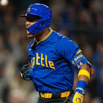 Seattle Mariners center fielder Julio Rodriguez celebrates after hitting a go-ahead home run during a game against the Texas Rangers on Friday at T-Mobile Park.