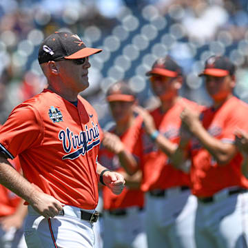 Jun 14, 2024; Omaha, NE, USA;  Virginia Cavalier head coach Brian O'Connor takes the field before the game against the North Carolina Tar Heels at Charles Schwab Filed Omaha. Mandatory Credit: Steven Branscombe-Imagn Images