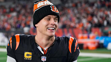 Bengals quarterback Joe Burrow celebrates a Week 17 overtime win over the Denver Broncos that kept Cincinnati's slim playoff hopes alive. Burrow threw for 412 yards and three touchdowns in the game and also added a rushing score.