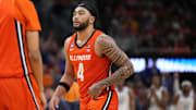 Mar 23, 2025; Milwaukee, WI, USA;  Illinois Fighting Illini guard Kylan Boswell (4) reacts after losing to the Kentucky Wildcats in the second round of the NCAA Tournament at Fiserv Forum. Mandatory Credit: Jeff Hanisch-Imagn Images