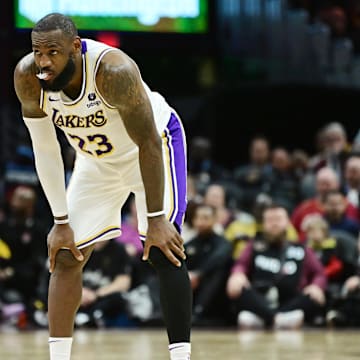 Nov 25, 2023; Cleveland, Ohio, USA; Los Angeles Lakers forward LeBron James (23) waits for action to resume during the second half against the Cleveland Cavaliers at Rocket Mortgage FieldHouse. Mandatory Credit: Ken Blaze-Imagn Images