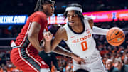 Illinois forward Carey Booth (0) drives on a defender in the Illini's 90-58 win over SIU Edwardsville on Nov. 8 at the State Farm Center in Champaign, Illinois.