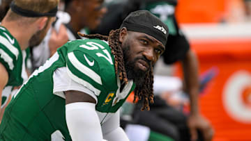 Sep 15, 2024; Nashville, Tennessee, USA;  New York Jets linebacker C.J. Mosley (57) looks up at the scoreboard from the bench against the Tennessee Titans during the second half during the second half at Nissan Stadium. Mandatory Credit: Steve Roberts-Imagn Images