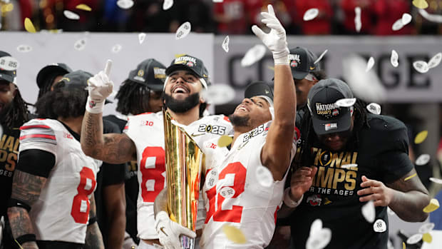 Ohio State Buckeyes running back TreVeyon Henderson (32) celebrates