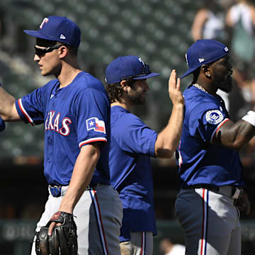 Aug 29, 2024; Chicago, Illinois, USA;  Texas Rangers shortstop Corey Seager (5) celebrates with teammates after the game against the Chicago White Sox at Guaranteed Rate Field. Mandatory Credit: Matt Marton-Imagn Images