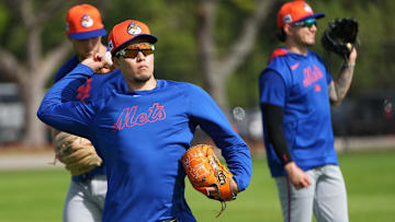New York Mets pitcher Kodai Senga (34) warms-up during Spring Training. 