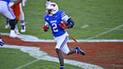 Oct 4, 2025; Dallas, Texas, USA; SMU Mustangs wide receiver Jordan Hudson (2) runs with the ball during the second half against the Syracuse Orange at Gerald J. Ford Stadium. Mandatory Credit: Jerome Miron-Imagn Images