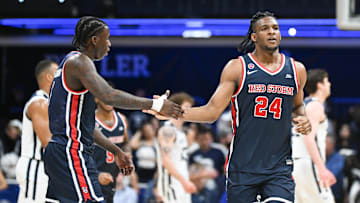 Feb 26, 2025; Indianapolis, Indiana, USA; St. John's basketball guard Kadary Richmond (1) high-fives St. John's Red Storm forward Zuby Ejiofor (24) after a play during the first half against the Butler Bulldogs at Hinkle Fieldhouse.