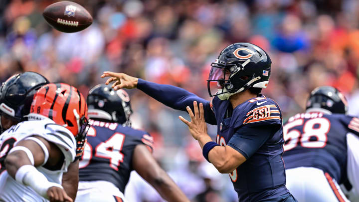 Caleb Williams beats the pass rush pressure with a throw during the first half of Saturday's 27-3 Bears win over the Bengals.