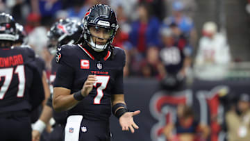 Jan 11, 2025; Houston, Texas, USA; Houston Texans quarterback C.J. Stroud (7) reacts after a play during the second quarter against the Los Angeles Chargers in an AFC wild card game at NRG Stadium.