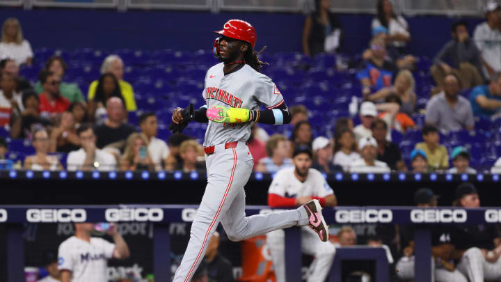 Aug 5, 2024; Miami, Florida, USA; Cincinnati Reds shortstop Elly De La Cruz (44) scores after a sacrifice fly by center fielder TJ Friedl (not pictured) during the third inning at loanDepot Park. Mandatory Credit: Sam Navarro-USA TODAY Sports