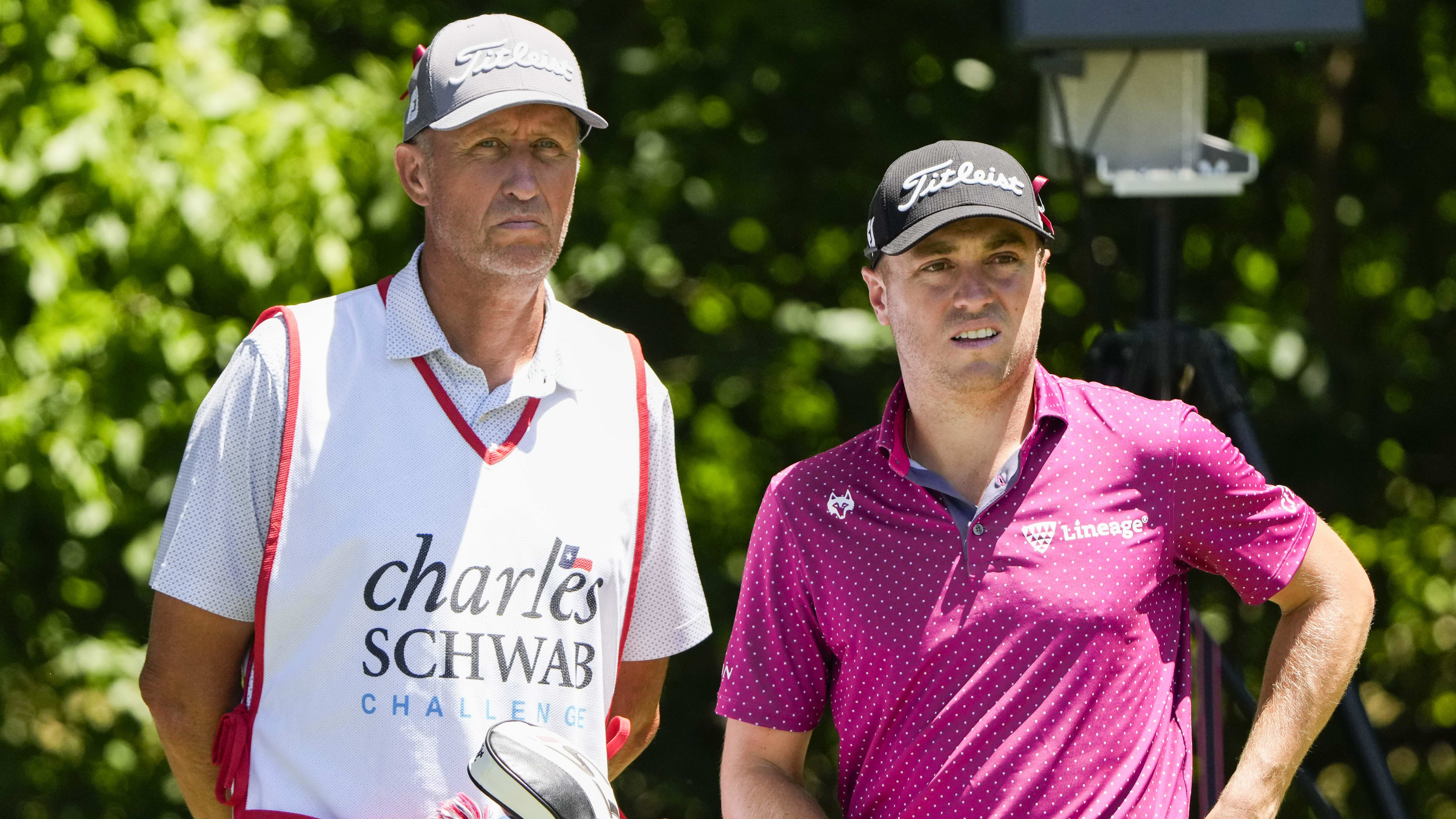Justin Thomas (right) and caddie Jim Mackay are pictured at the 2022 Charles Schwab Challenge.