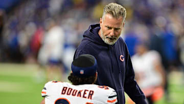 Sep 22, 2024; Indianapolis, Indiana, USA; Chicago Bears defensive end Austin Booker (94) shares a moment with Chicago Bears head coach Matt Eberflus before the game against the Indianapolis Colts at Lucas Oil Stadium. Mandatory Credit: Marc Lebryk-Imagn Images

