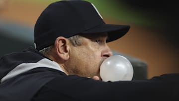 Sep 3, 2025; Houston, Texas, USA; New York Yankees manager Aaron Boone blows a bubble in the dugout during the second inning against the Houston Astros at Daikin Park. Mandatory Credit: Troy Taormina-Imagn Images