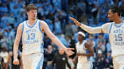Dec 7, 2025; Chapel Hill, North Carolina, USA; North Carolina Tar Heels center Henri Veesaar (13) reacts with forward Jarin Stevenson (15) after the game at Dean E. Smith Center. Mandatory Credit: Bob Donnan-Imagn Images