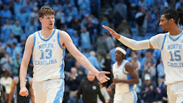 Dec 7, 2025; Chapel Hill, North Carolina, USA; North Carolina Tar Heels center Henri Veesaar (13) reacts with forward Jarin Stevenson (15) after the game at Dean E. Smith Center. Mandatory Credit: Bob Donnan-Imagn Images