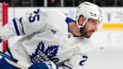 Mar 5, 2025; Las Vegas, Nevada, USA; Toronto Maple Leafs defenseman Conor Timmins (25) warms up before a game against the Vegas Golden Knights at T-Mobile Arena. Mandatory Credit: Stephen R. Sylvanie-Imagn Images