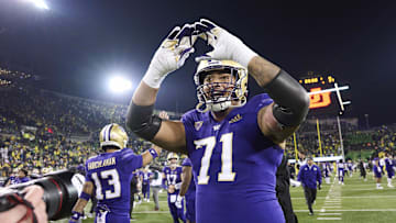 Nov 12, 2022; Eugene, Oregon, USA; Washington Huskies offensive lineman Nate Kalepo (71) celebrates