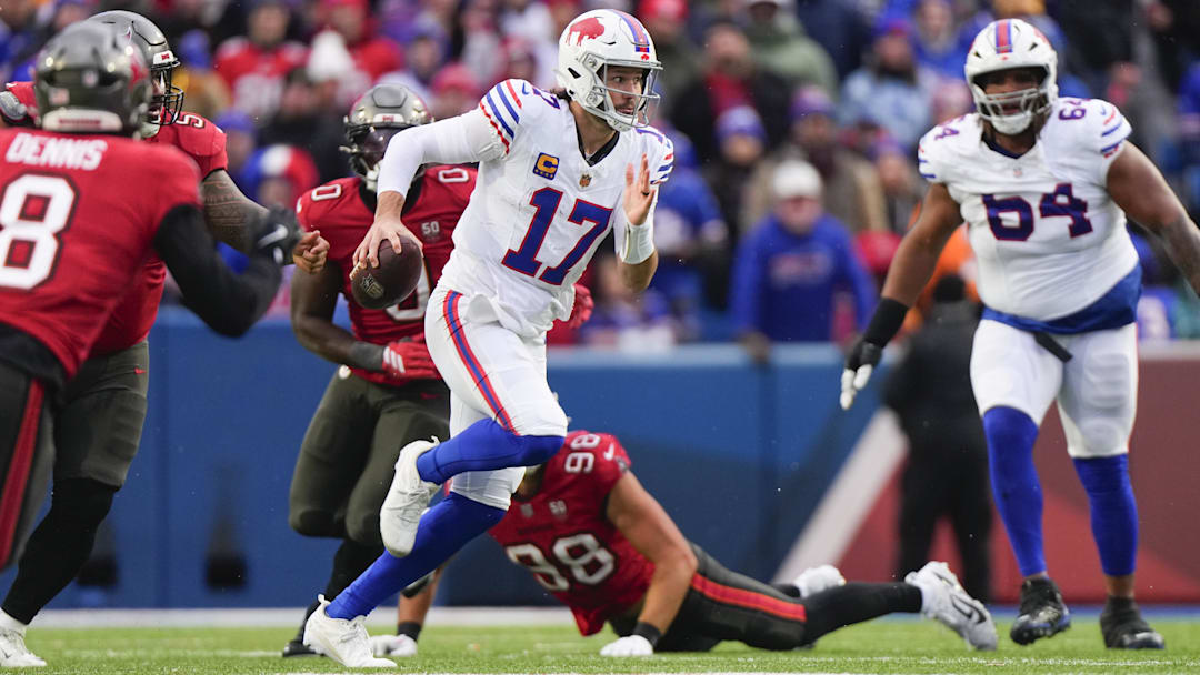 Nov 16, 2025; Orchard Park, New York, USA;  Buffalo Bills quarterback Josh Allen (17) scrambles against the Tampa Bay Buccaneers