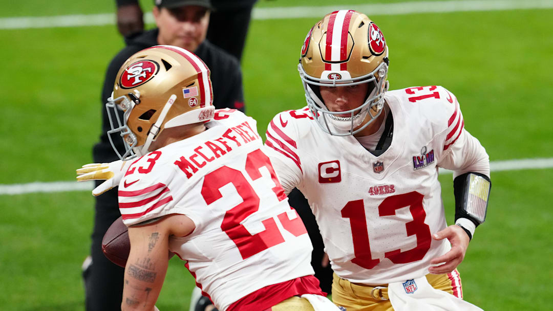 Feb 11, 2024; Paradise, Nevada, USA; San Francisco 49ers quarterback Brock Purdy (13) hands off to San Francisco 49ers running back Christian McCaffrey (23) as they warm up before playing the Kansas City Chiefs in Super Bowl LVIII at Allegiant Stadium. Mandatory Credit: Stephen R. Sylvanie-Imagn Images