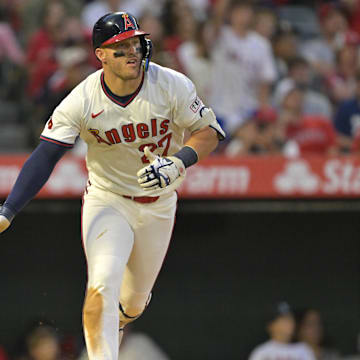 Jul 12, 2025; Anaheim, California, USA;  Los Angeles Angels right fielder Mike Trout (27) watches the flight of the ball on his two-run home run during the fifth inning against the Arizona Diamondbacks at Angel Stadium. Mandatory Credit: Jayne Kamin-Oncea-Imagn Images