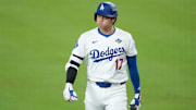 Oct 29, 2025; Los Angeles, California, USA; Los Angeles Dodgers two-way player Shohei Ohtani (17) reacts after grounding out against the Toronto Blue Jays in the eighth inning during game five of the 2025 MLB World Series at Dodger Stadium. Mandatory Credit: Kirby Lee-Imagn Images