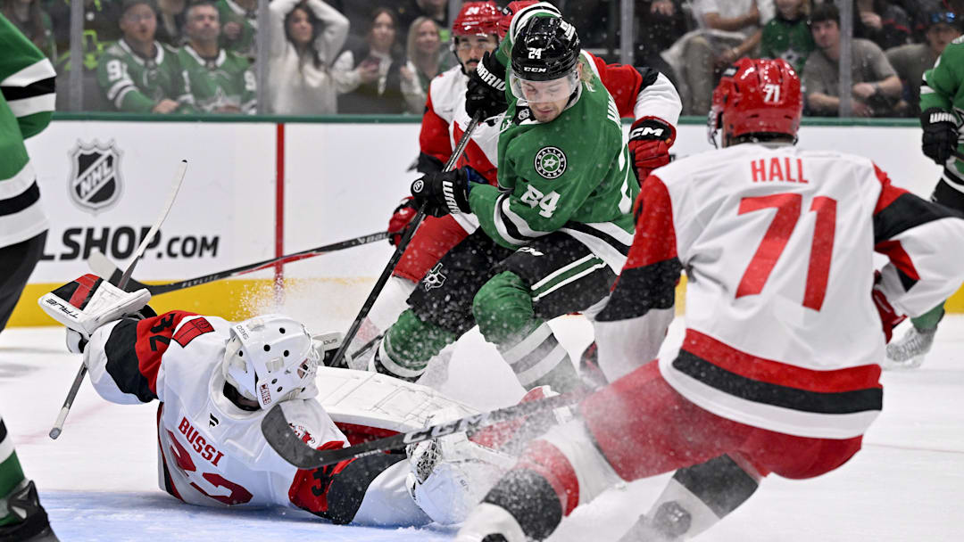 Oct 25, 2025; Dallas, Texas, USA; Carolina Hurricanes goaltender Brandon Bussi (32) stops a shot by Dallas Stars center Roope Hintz (24) during the second period at the American Airlines Center. Mandatory Credit: Jerome Miron-Imagn Images Oct 25, 2025; Dallas, Texas, USA; Carolina Hurricanes goaltender Brandon Bussi (32) stops a shot by Dallas Stars center Roope Hintz (24) during the second period at the American Airlines Center. Mandatory Credit: Jerome Miron-Imagn Images
