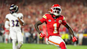 Worthy (1) scores a touchdown against the Baltimore Ravens during the first half at Arrowhead Stadium.