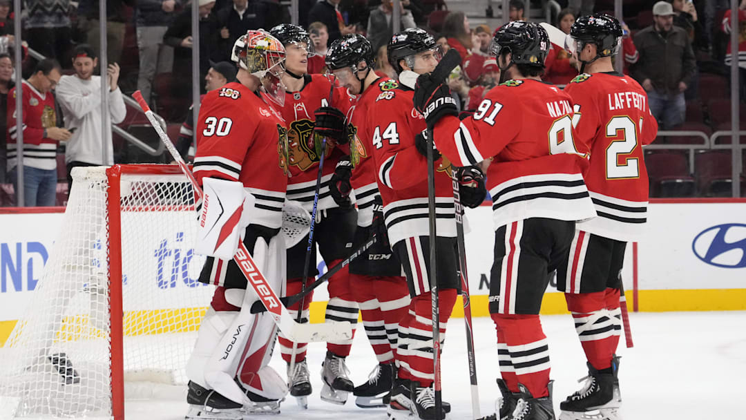 Dec 10, 2025; Chicago, Illinois, USA; The Chicago Blackhawks celebrate their win against the New York Rangers at United Center. Mandatory Credit: David Banks-Imagn Images Dec 10, 2025; Chicago, Illinois, USA; The Chicago Blackhawks celebrate their win against the New York Rangers at United Center. Mandatory Credit: David Banks-Imagn Images