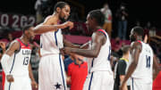 Aug 7, 2021; Saitama, Japan; USA player Kevin Durant (7) and USA player Jrue Holiday (12) react after winning the gold medal game during the Tokyo 2020 Olympic Summer Games at Saitama Super Arena. Mandatory Credit: Kyle Terada-USA TODAY Sports