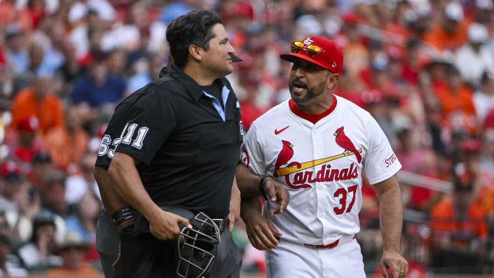 May 22, 2024; St. Louis, Missouri, USA;  St. Louis Cardinals manager Oliver Marmol (37) argues with umpire Charlie Roos (111) after he was ejected during the third inning against the Baltimore Orioles at Busch Stadium. Mandatory Credit: Jeff Curry-USA TODAY Sports