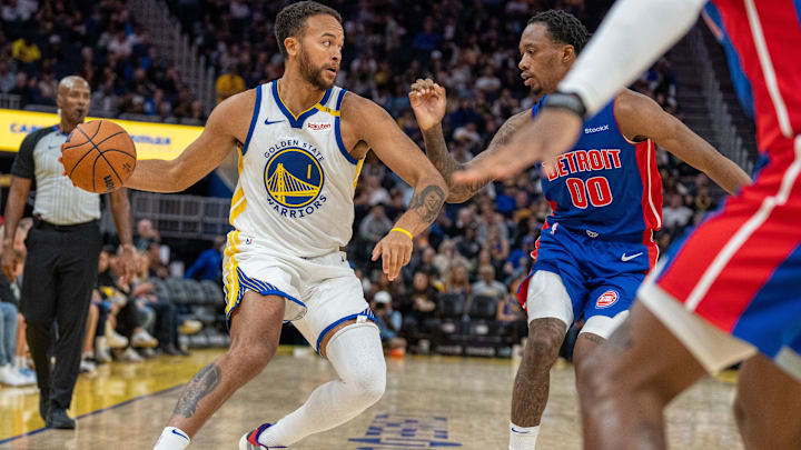 Oct 13, 2024; San Francisco, California, USA;  Golden State Warriors forward Kyle Anderson (1) dribbles the basketball against Detroit Pistons forward Ron Holland II (00): Neville E. Guard-Imagn Images