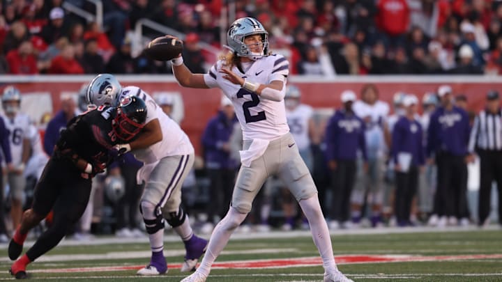 Nov 22, 2025; Salt Lake City, Utah, USA; Kansas State Wildcats quarterback Avery Johnson (2) throws the ball against the Utah Utes during the second half at Rice-Eccles Stadium. 
