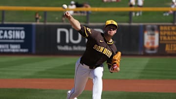 Feb 25, 2025; Peoria, Arizona, USA; San Diego Padres pitcher Stephen Kolek (32) throws against the Los Angeles Angels during the first inning at Peoria Sports Complex. Mandatory Credit: Rick Scuteri-Imagn Images