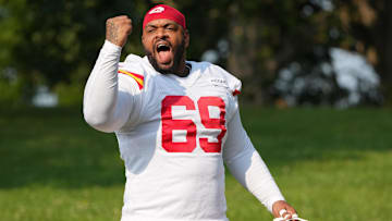 Jul 22, 2024; St. Joseph, MO, USA; Kansas City Chiefs defensive tackle Mike Pennel Jr. (69) gestures to fans while walking from the locker room to the fields prior to training camp at Missouri Western State University. Mandatory Credit: Denny Medley-Imagn Images