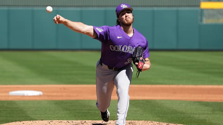 Mar 6, 2026; Mesa, Arizona, USA; Colorado Rockies pitcher Chase Dollander (32) throws against the Colorado Rockies in the first inning at Hohokam Stadium. Mandatory Credit: Rick Scuteri-Imagn Images