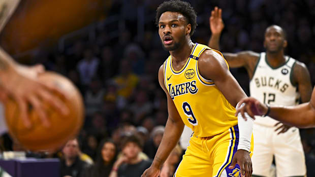 Mar 20, 2025; Los Angeles, California, USA; Los Angeles Lakers guard Bronny James (9) defends against the Milwaukee Bucks dur