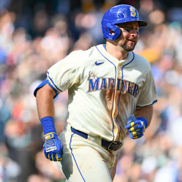 Seattle Mariners catcher Cal Raleigh runs after hitting a two-run home run against the Oakland Athletics on Sept. 29 at T-Mobile Park.