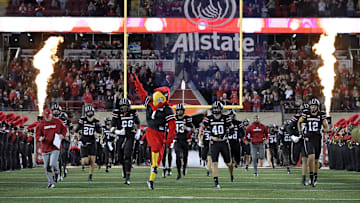Oct 25, 2025; Louisville, Kentucky, USA;  The Louisville Cardinals mascot leads the team onto the field before the first quarter against the Boston College Eagles at L&N Federal Credit Union Stadium. Mandatory Credit: Jamie Rhodes-Imagn Images