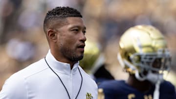 Notre Dame head coach Marcus Freeman jogs the field during warm ups before a NCAA college football game between Notre Dame and Northern Illinois at Notre Dame Stadium on Saturday, Sept. 7, 2024, in South Bend.