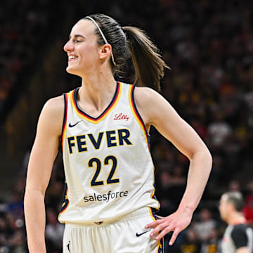 Indiana Fever guard Caitlin Clark (22) reacts during the first quarter against the Brazil National Team at Carver-Haweye Arena.