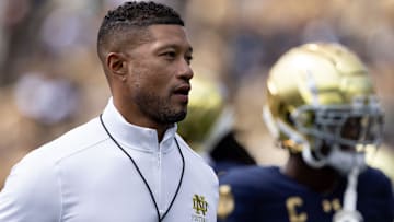 Notre Dame head coach Marcus Freeman jogs the field during warm ups before a NCAA college football game between Notre Dame and Northern Illinois at Notre Dame Stadium on Saturday, Sept. 7, 2024, in South Bend.