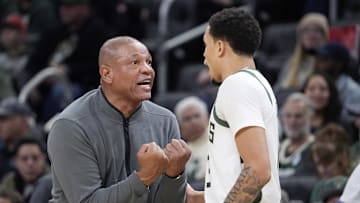 Milwaukee Bucks head coach Doc Rivers has a talk with Milwaukee Bucks guard Ryan Rollins in the first half against the Houston Rockets at Fiserv Forum on November 9.