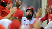 Sep 4, 2024; Anaheim, California, USA;  Los Angeles Angels third baseman Anthony Rendon (6)is congratulated in the dugout after scoring on a home run by center fielder Mickey Moniak (16) in the first inning against the Los Angeles Dodgers at Angel Stadium. Mandatory Credit: Jayne Kamin-Oncea-Imagn Images