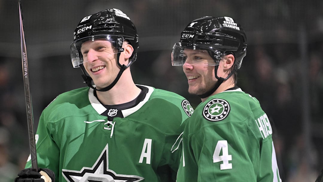 Jan 20, 2026; Dallas, Texas, USA;  Dallas Stars defenseman Esa Lindell (23) and defenseman Miro Heiskanen (4) celebrates a goal scored by Lindell against the Boston Bruins during the second period at the American Airlines Center. Mandatory Credit: Jerome Miron-Imagn Images
