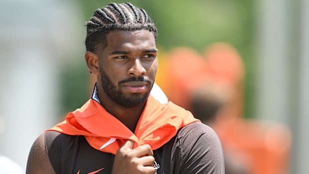 Jun 10, 2025; Berea, OH, USA; Cleveland Browns quarterback Shedeur Sanders (12) walks off the field during minicamp at CrossC