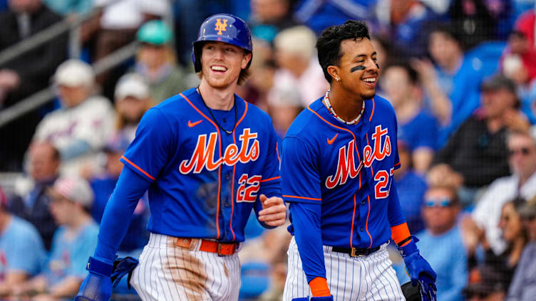 Mar 19, 2023; Port St. Lucie, Florida, USA; New York Mets third baseman Brett Baty (22) and New York