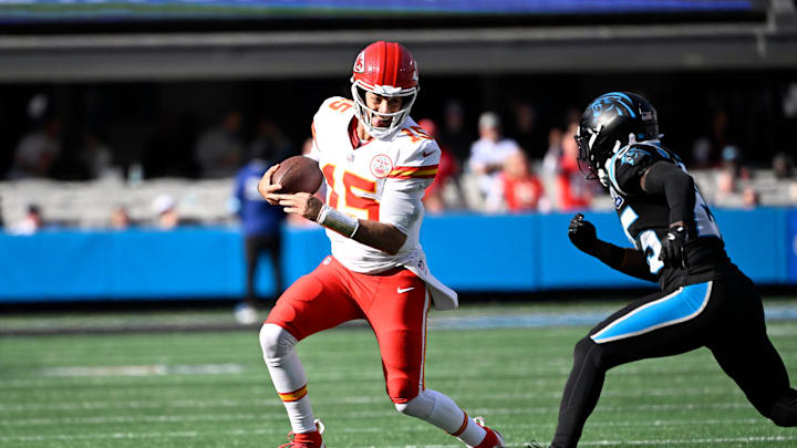 Patrick Mahomes runs the ball during the Chiefs' 30–27 win over the Panthers on Nov. 24, 2024.
