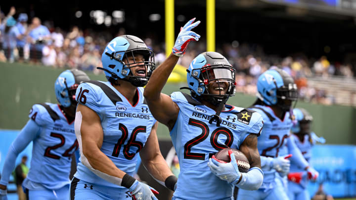 Mar 30, 2024; Arlington, TX, USA; Arlington Renegades linebacker Storey Jackson (16) and cornerback Duron Lowe (29) celebrate after Lowe intercepts a pass against the Birmingham Stallions during the first half at Choctaw Stadium. Mandatory Credit: Jerome Miron-USA TODAY Sports