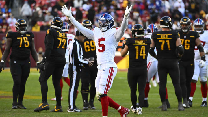 Nov 19, 2023; Landover, Maryland, USA; New York Giants linebacker Kayvon Thibodeaux (5) celebrates after a sack against the Washington Commanders during the second half at FedExField.  
